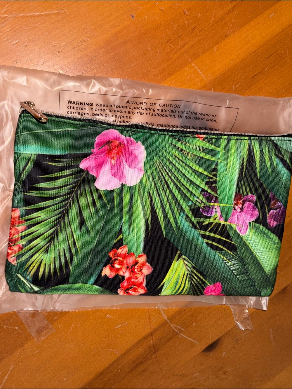 American Vintage tropical orchid & palm leaf print makeup bag with gold zipper
